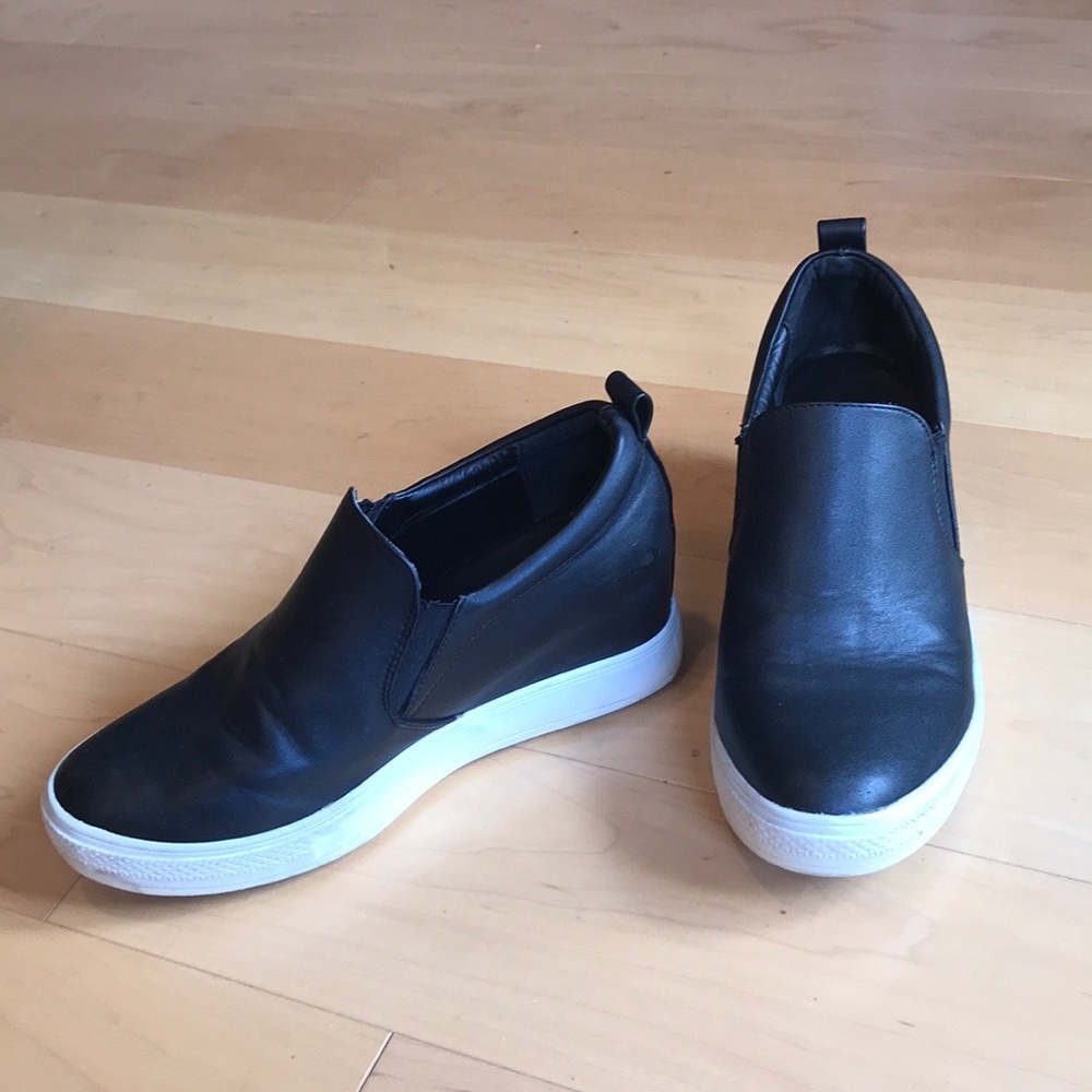 Slip on wedge sneakers.